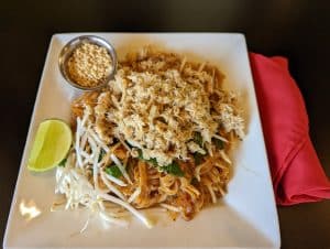 Crab noodles from Tasty Thai Tempe with tender noodles, crab meat, and vegetables in a light Thai sauce near South Tempe.