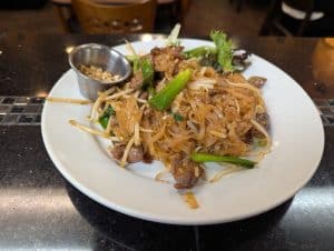 Pad Thai from Tasty Thai Tempe with rice noodles, egg, bean sprouts, and crushed peanuts near ASU campus.