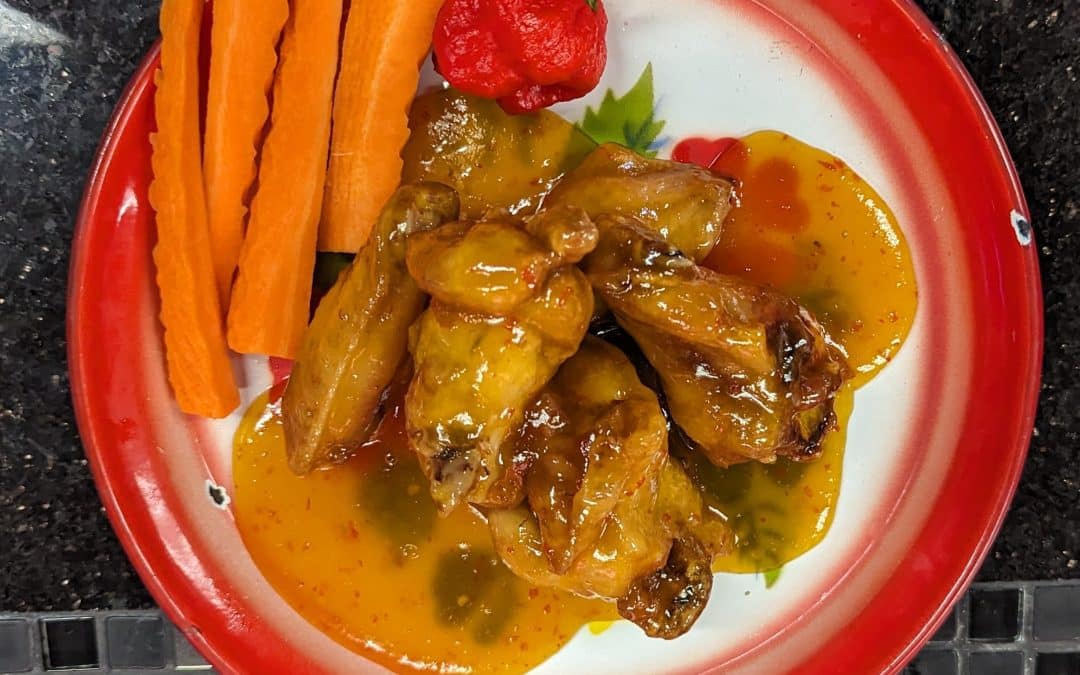 Mango Hellfire ghost pepper chicken wings at Tasty Thai in Tempe, Arizona