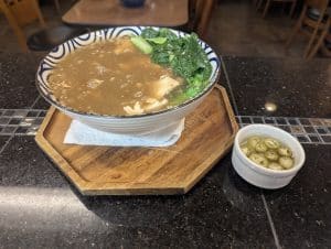 Thai Rad Na with rich gravy and Chinese broccoli, served at Tasty Thai Tempe